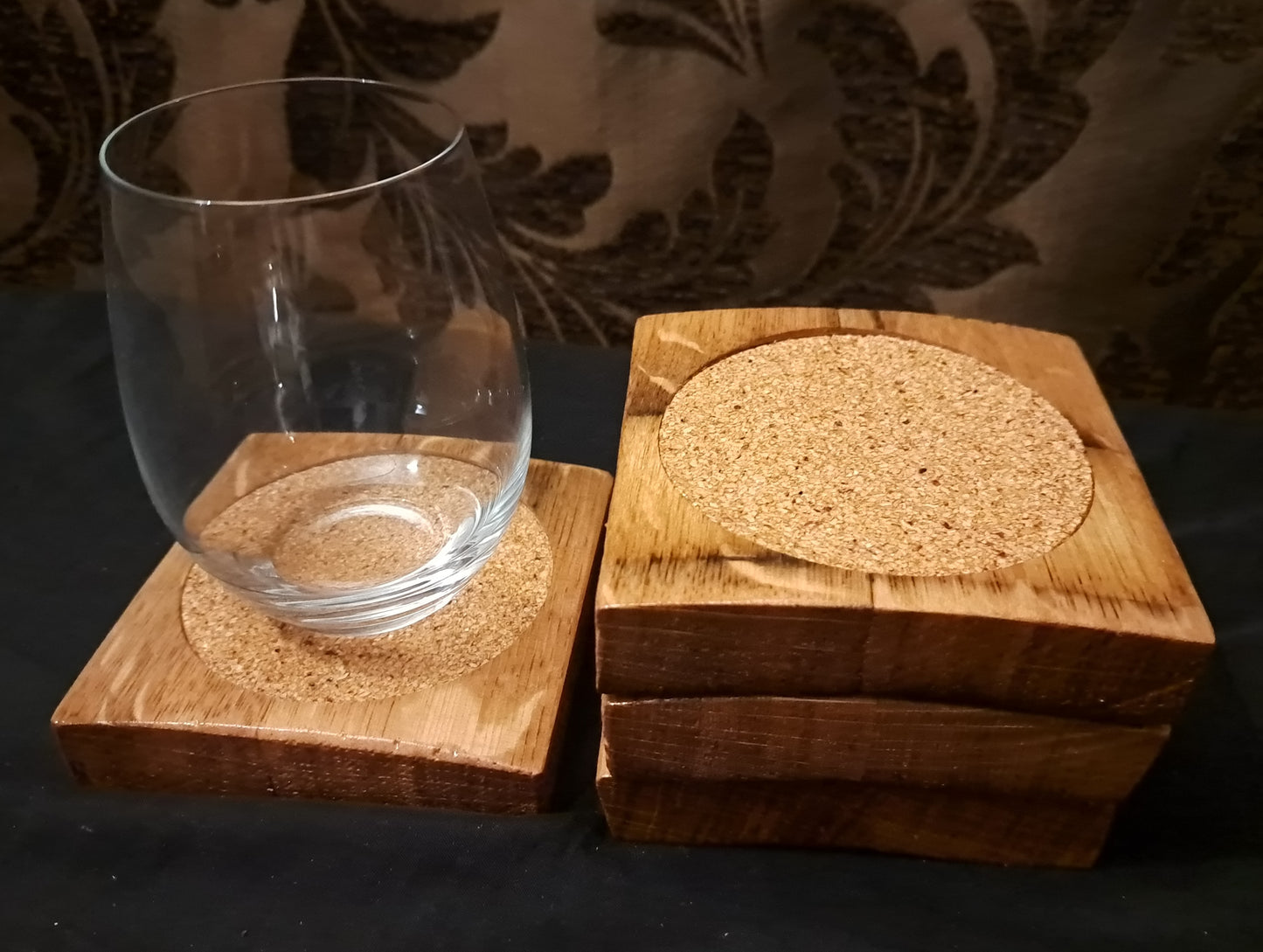 Wine barrel coaster